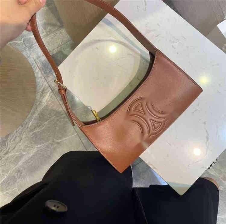

Factory Direct Sales of New Luxury Brand Bags Designer bag Tote 2023 and Summer Arc De Leather Underarm for Women Advanced Sense Simple Portable Oblique Cross bags, Peach