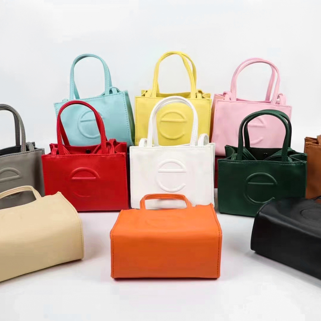 

Luxurys Designers Shopping Bags totes summer travel vacation CrossBody womens men tote Portable Luggage Fashion Wallets PU famous Shoulder sling Holders hangbag