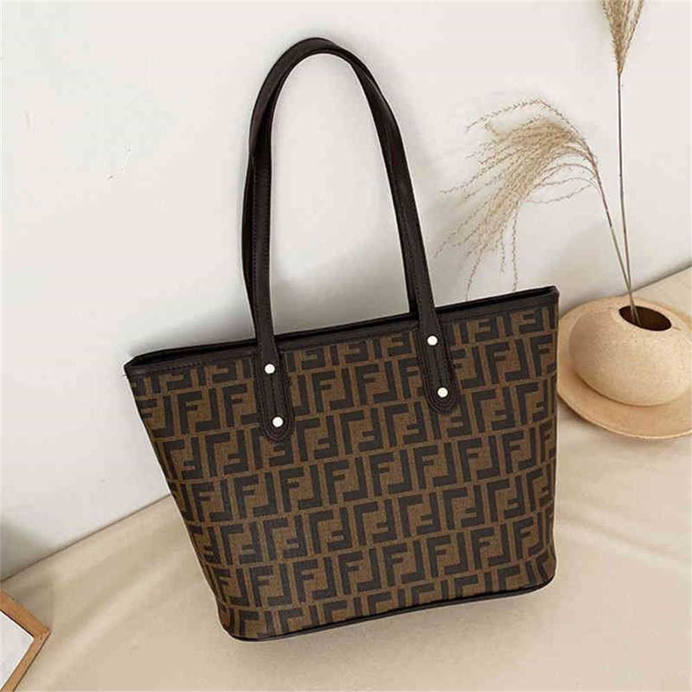 

Designer handbag Store 70% Off Handbag capacity Tote foreign style portable single diagonal armpit sales, Second dark brown