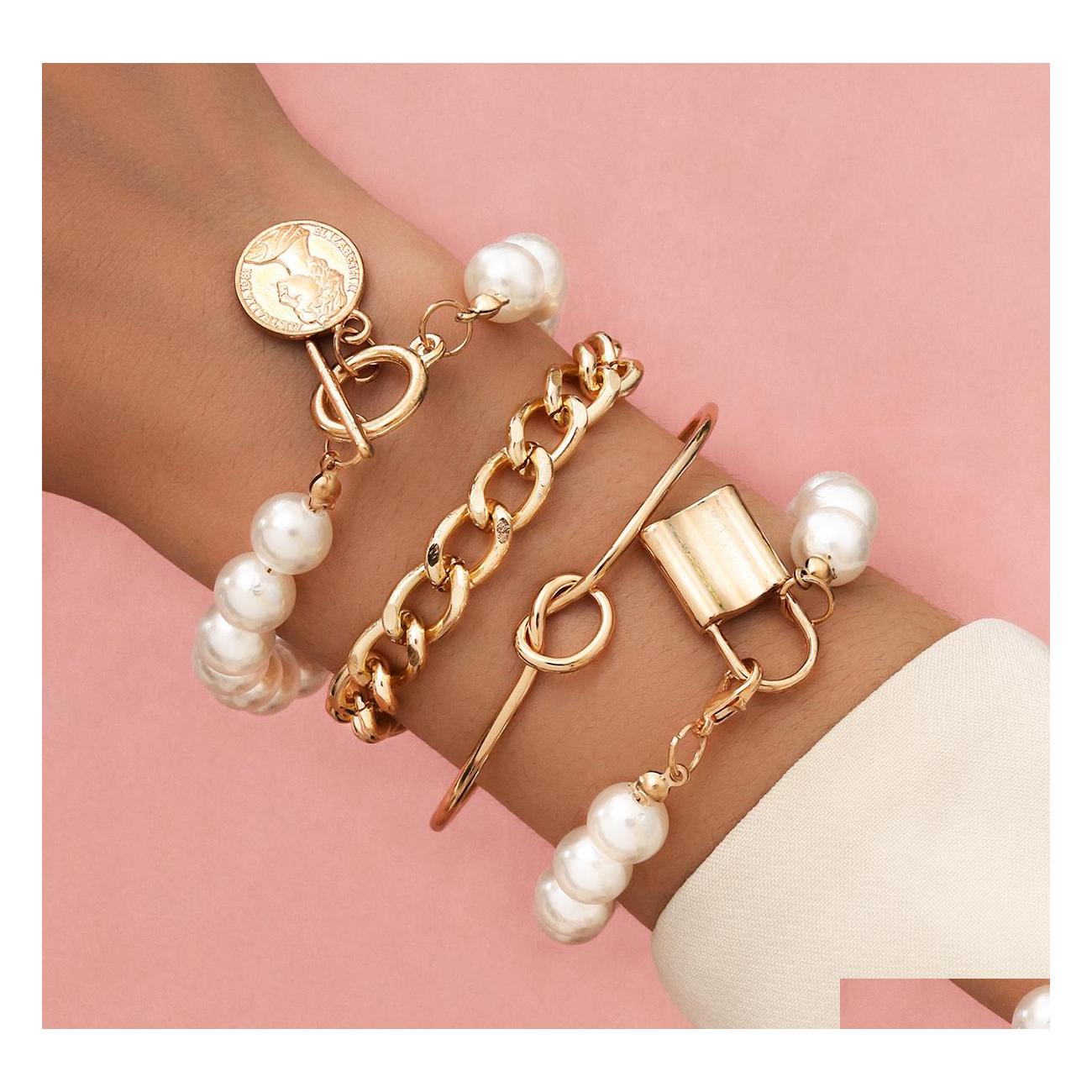 

Link Chain Exaggerated Punk Bracelet Set Street Embossed Portrait 4 Fourpiece Pearl Lock Bracelets Sets For Men And Women Couple Dr Dhm06