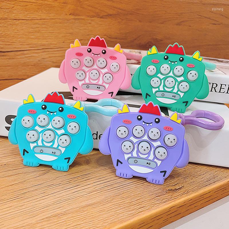 

Keychains Hip Cool Dinosaur Keychain Gopher Machine Children's Puzzle Game Bag Key Chain Christmas Gift For Mum Jewelry Wholesale