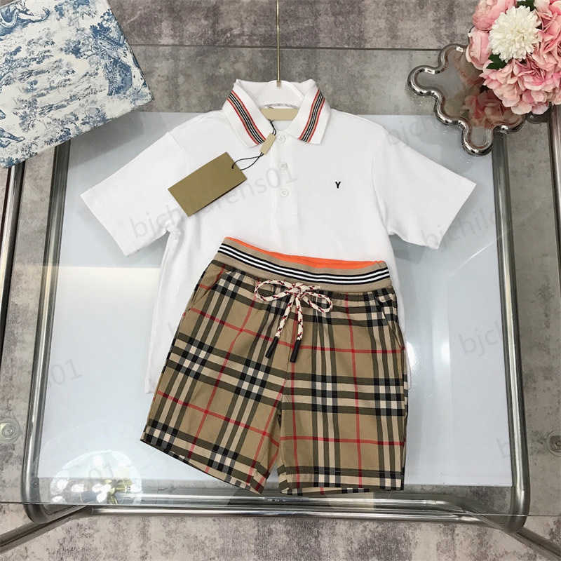 

Kids Clothes Sets Summer Boys White Refreshing Polo Threaded Neck Shirt Classic Plaid Shorts Set Imported Elastic Beaded Cotton Fabric Baby Clothes 0206