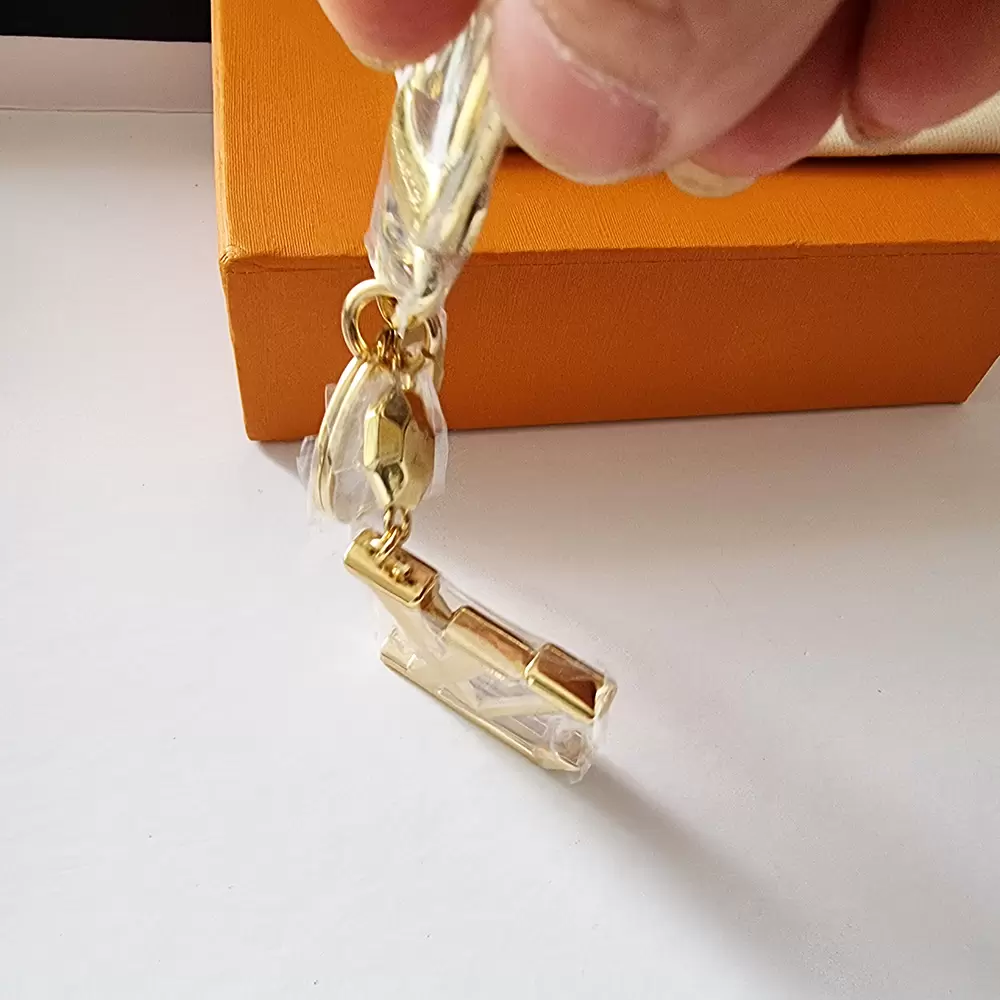 

New alloy gold design astronaut keychains accessories designer keyring solid metal car key ring gift box packaging