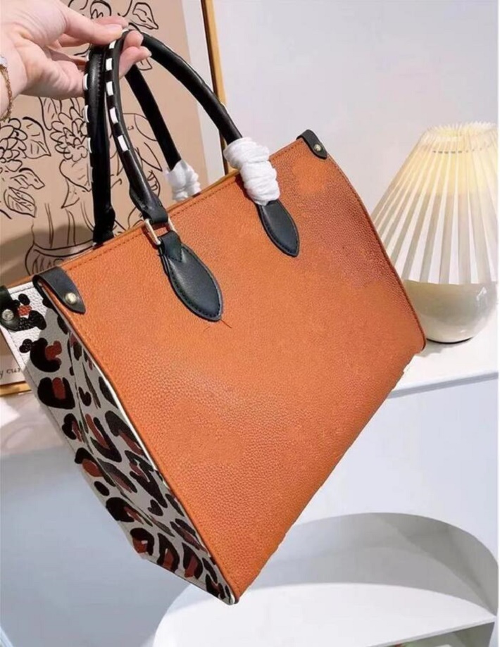 

2023 new handbag Fashion Designers ONTHEGO Handbag Luxurys Bags handbags Ladies Shoulder Bag Patent Leather Diamond Evening Cross body 699, This is not for sale