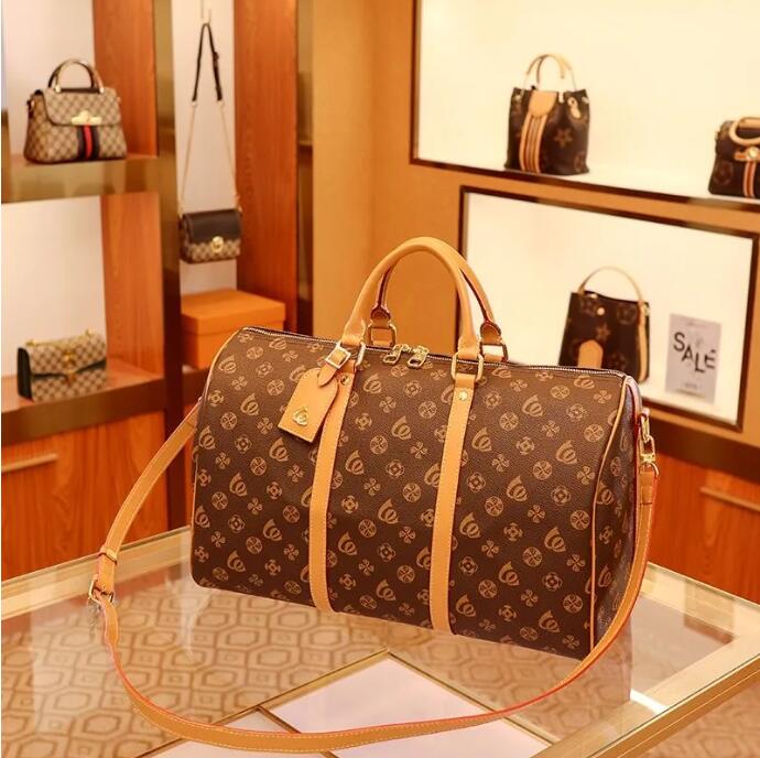 

2023 Double duffle bag Duffel Bags luggages Travelling handBags Women capacity luggage bag baggage waterproof handbag Casual Travel SIZE 55CM, This is not for sale