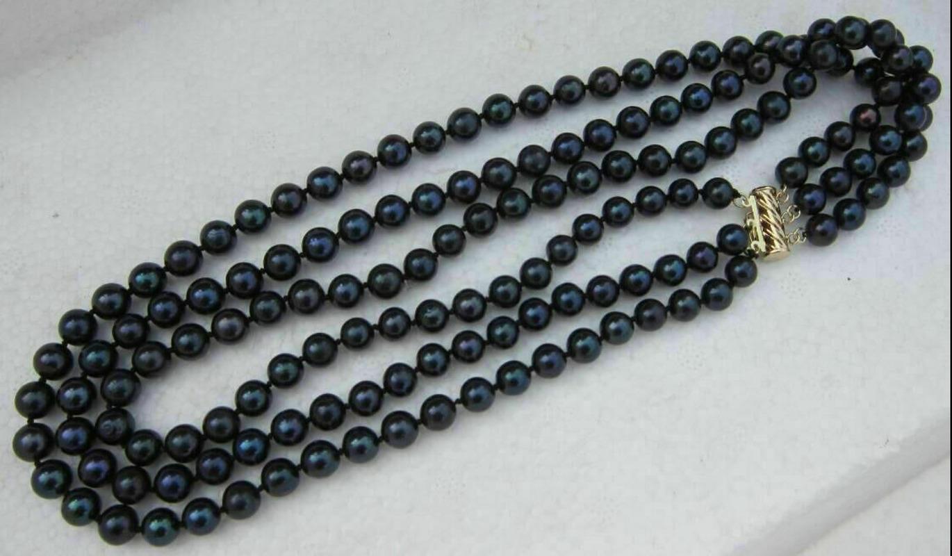 

Chains 17-19" 8- 9 MM SOUTH SEA NATURAL Black PEARL NECKLACE