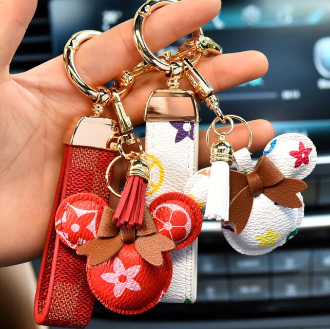 

Designer Keychain Wallet Keyring Fashion Purse Pendant Car Chain Charm Bucket Bag Flower Mini Coin Holder Keychains Bag Trinket Gifts Accessories