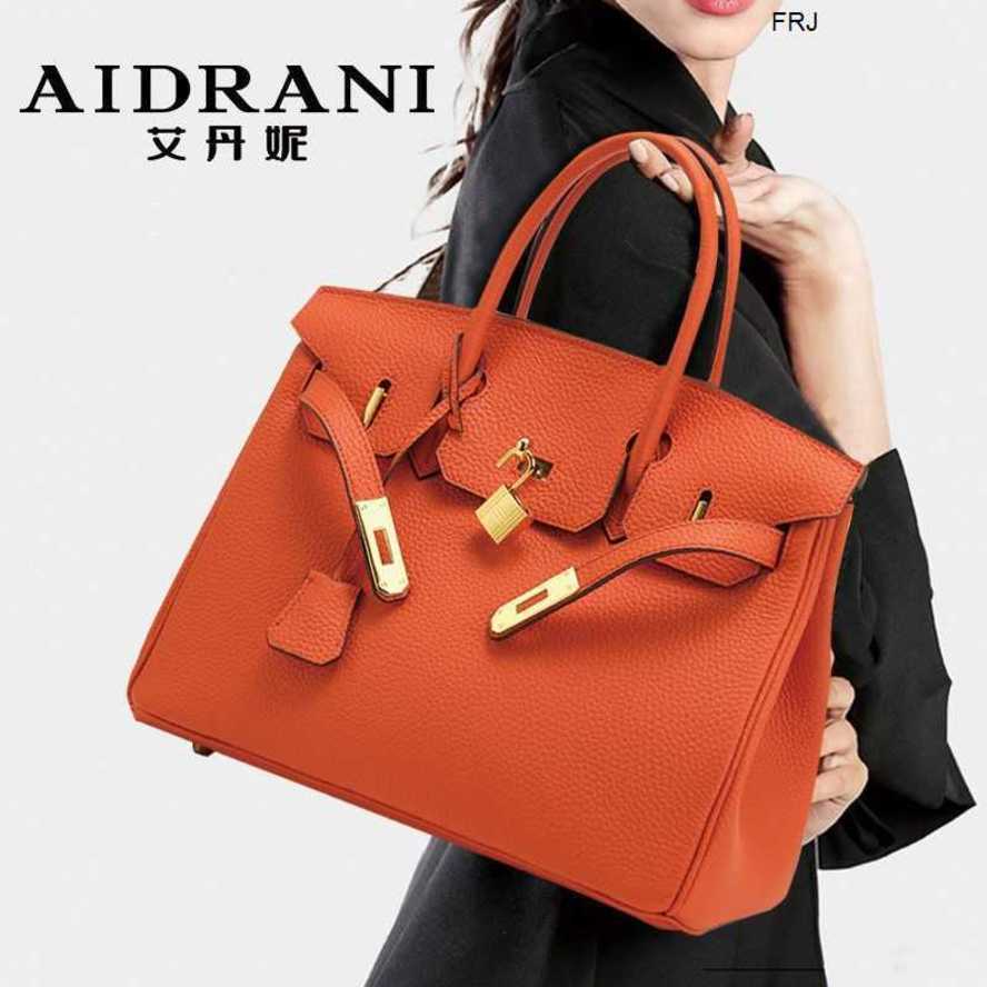 

Designer Bags Birkin Handbags Herme Tote Bag Leather Womens Large Capacity Handbag 2023 New Temperament Lichee Pattern Wrap Head Layer Cow Women Have Logo Frj, Orange trumpet