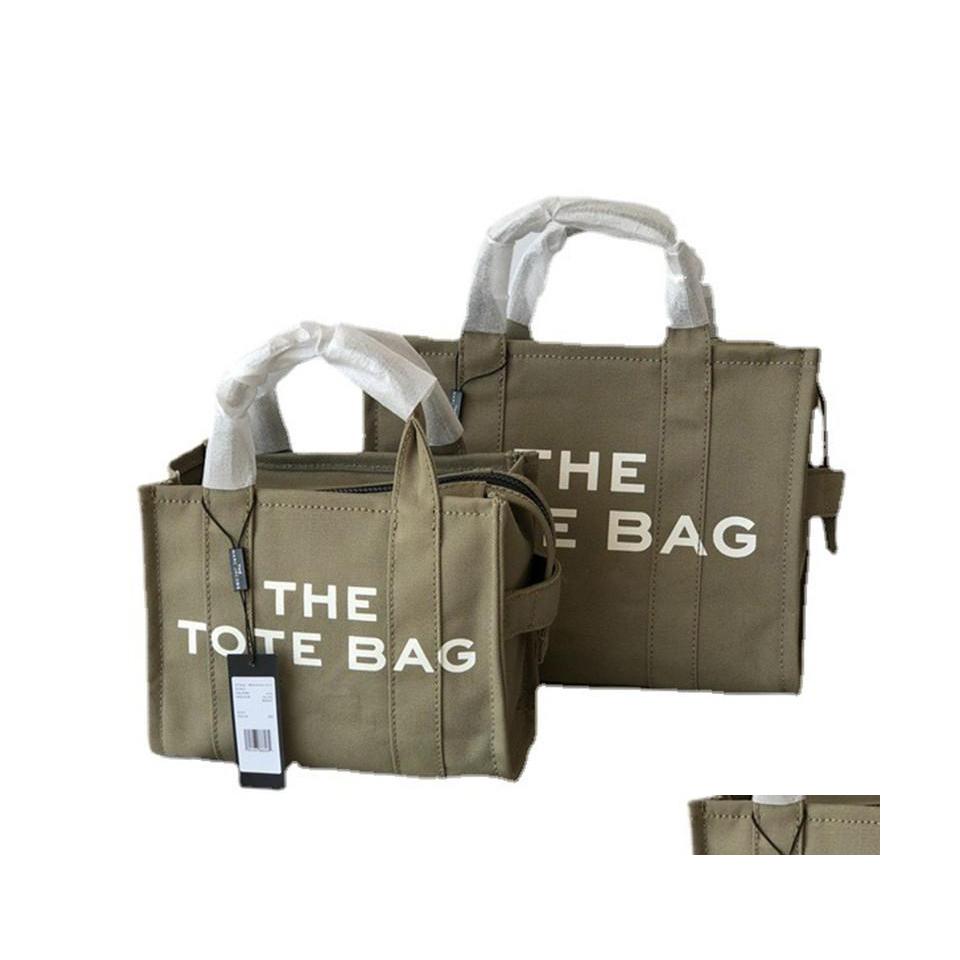 

Cosmetic Bags Cases Marc Tote Womens Totes Fashion Shopper Shoder Bag Canvas Woody Handbags 24Cm 32Cm Two Size L0092 Drop Delivery Dhdao, Black