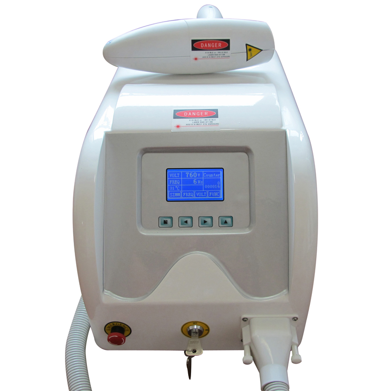

ND Yag Laser with carbon powder treatment head for tattoo removal