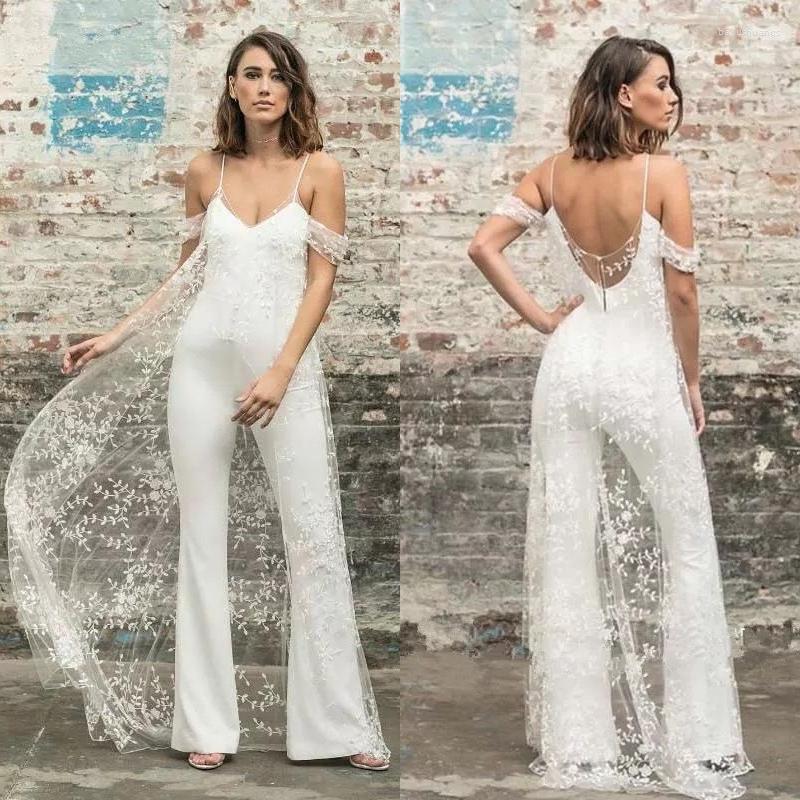 

Wedding Dress Jumpsuit Dresses With Cape 2023 Off The Shoulder Spaghetti Straps Lace Appliques Tulle Bridal Gown Sexy Open Back, White