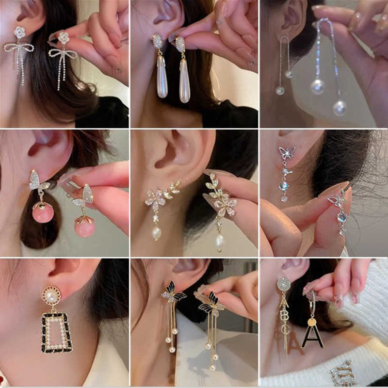 

new flower earrings temperament long tassel earrings net red pearl butterfly
