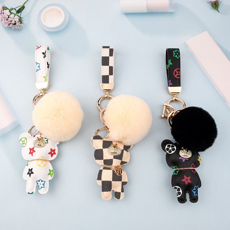

Wholesale Designer Key Rings Bear PU Leather Keychains Purse Pendant Car Keyring Chain Charm Brown Flower Mini Bag Tassel Gift for Men Women Accessories