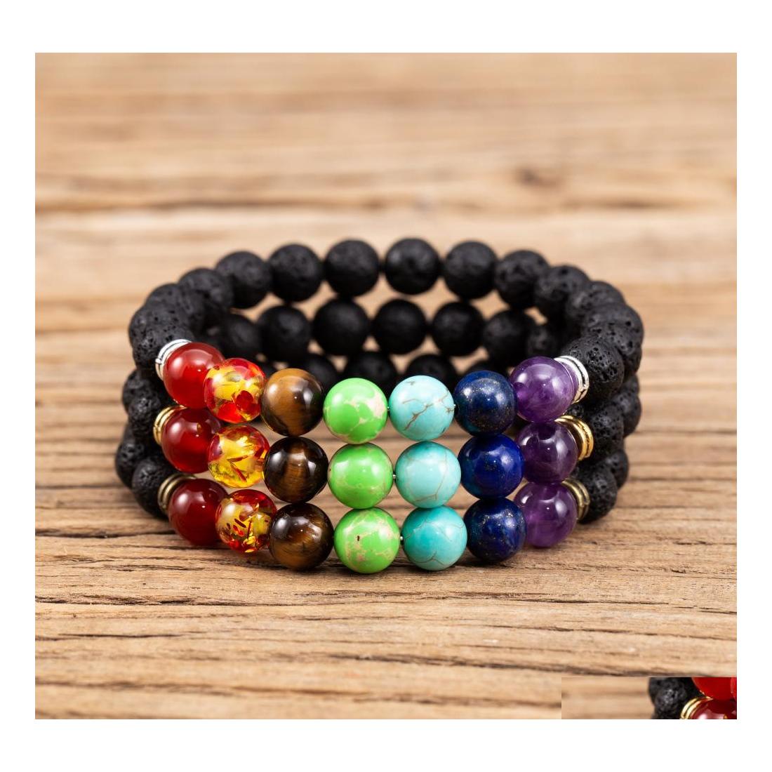 

Charm Bracelets 7 Chakras 8Mm Black Lava Stone Bracelet Diy Aromatherapy Essential Oil Diffuser Buddha Mala Yoga Jewelry Drop Deliver Dhni9