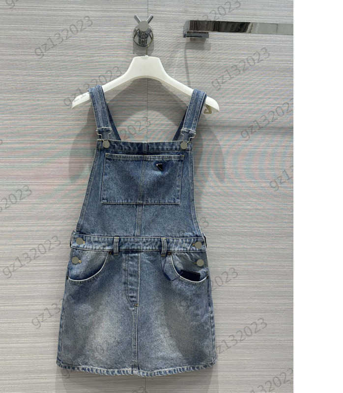

Denim Strappy Dress Metal Safety Buckle Design Cuffless Pocket Dresses Imported Twill Denim Fabric Joker Slimming Maxiskit Womens Elegant Dress 1970