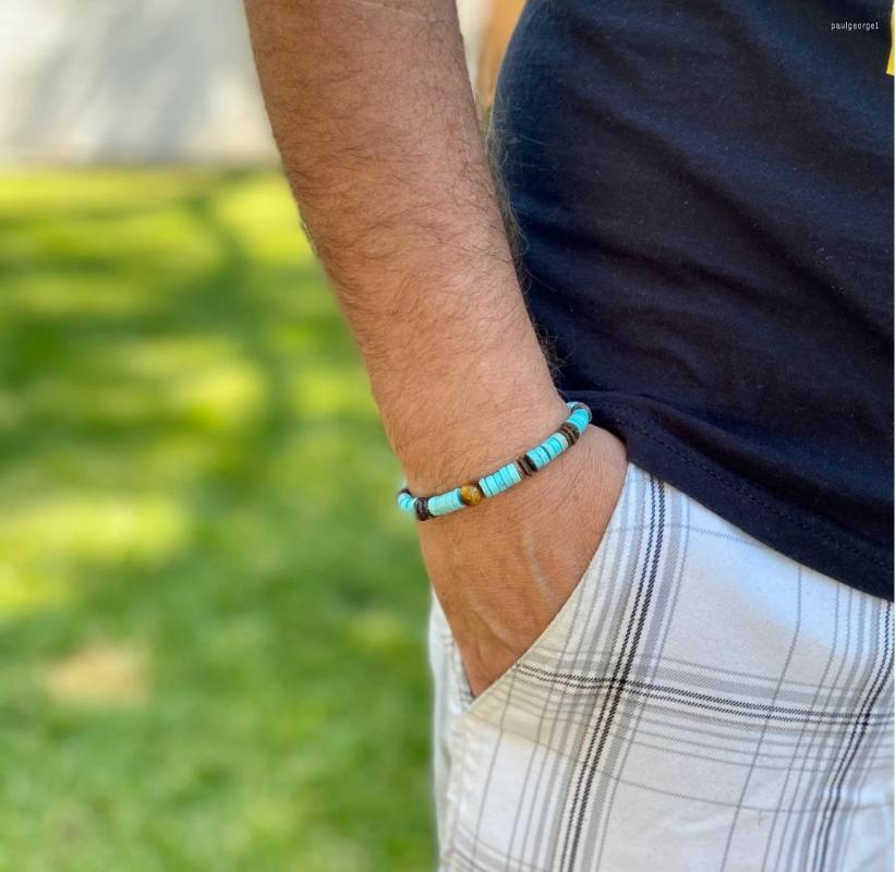 

Strand Heishi Turquoise Coconut And Yellow Tiger Eye Bracelet