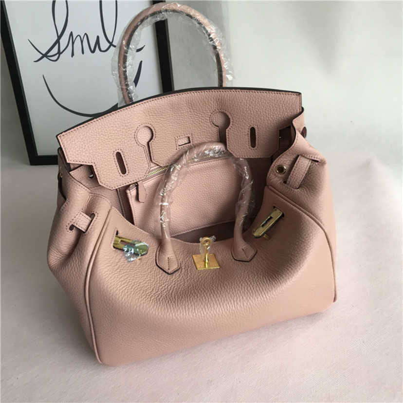 

High Quality Design Bags Women's layer leather pattern pink portable one-shoulder diagonal bag 49%off Factory Handbag Purse for Women, 20cm leather shoulder strap