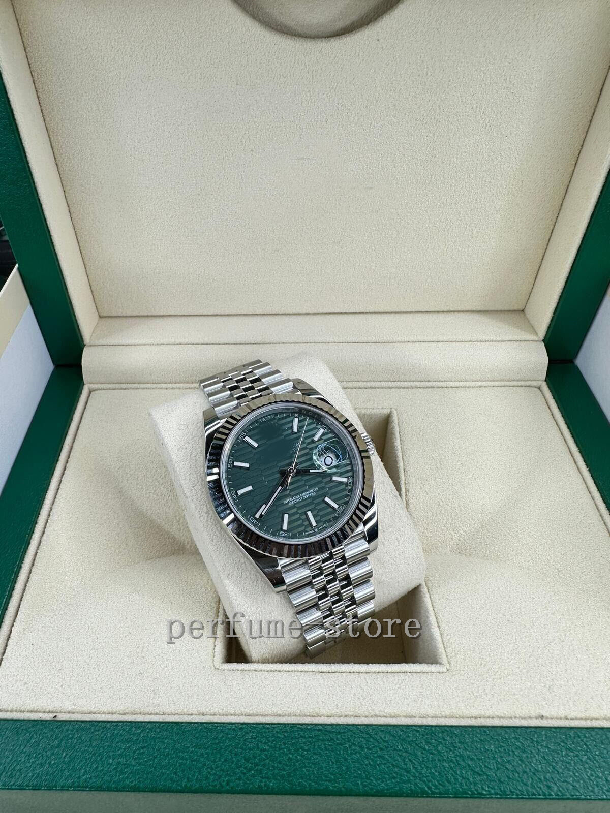 

Luxury Wristwatch Automatic 2023 QC BRAND DATEJUST 41 126334 18K W Gold Fluted Bezel Mint Green on the official website, Watch