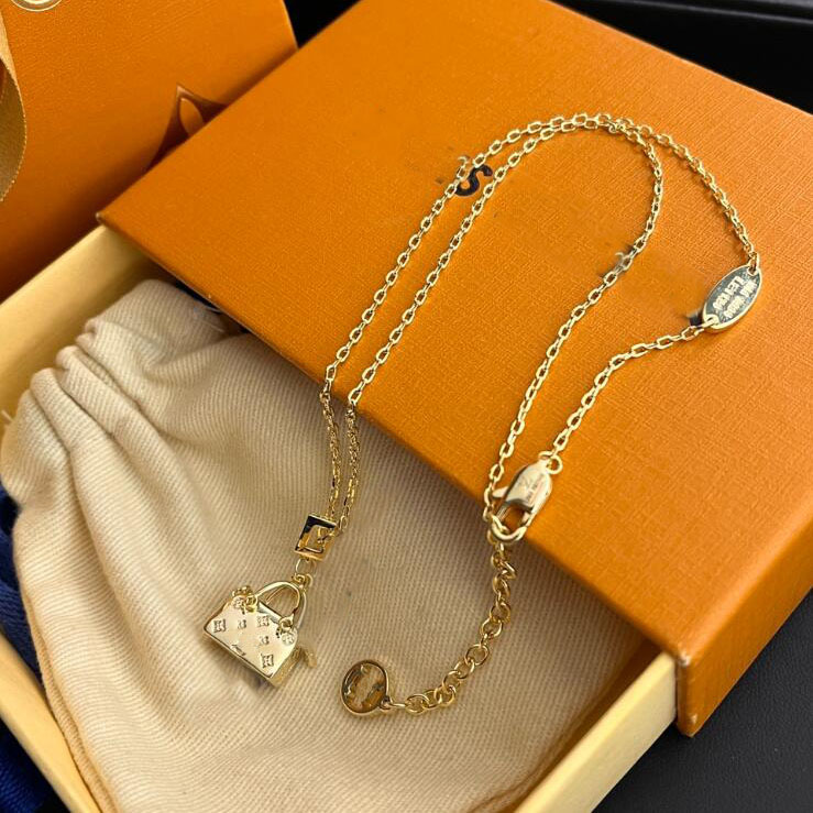 

Luxury Brand Designer Pendant Necklace Fashion 18K Gold Plated Bag Design Long Chain Stainless Steel Jewelry X501 Without Box