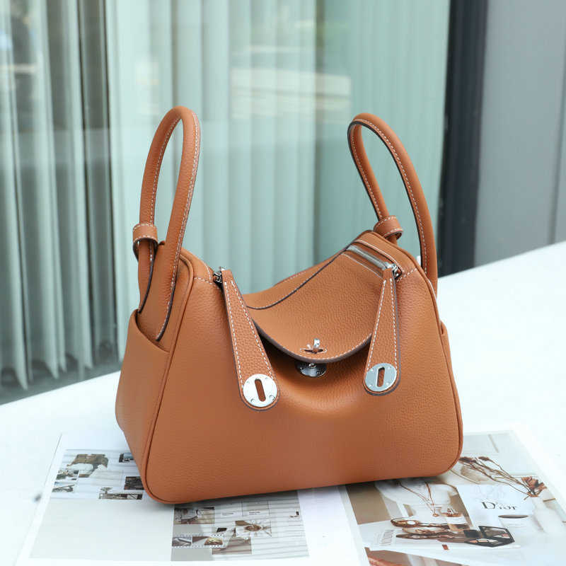 

Designer Herme Lindi Bags online outlet 2023 new top layer cowhide silver buckle leather women's bag bucket fa, Black10