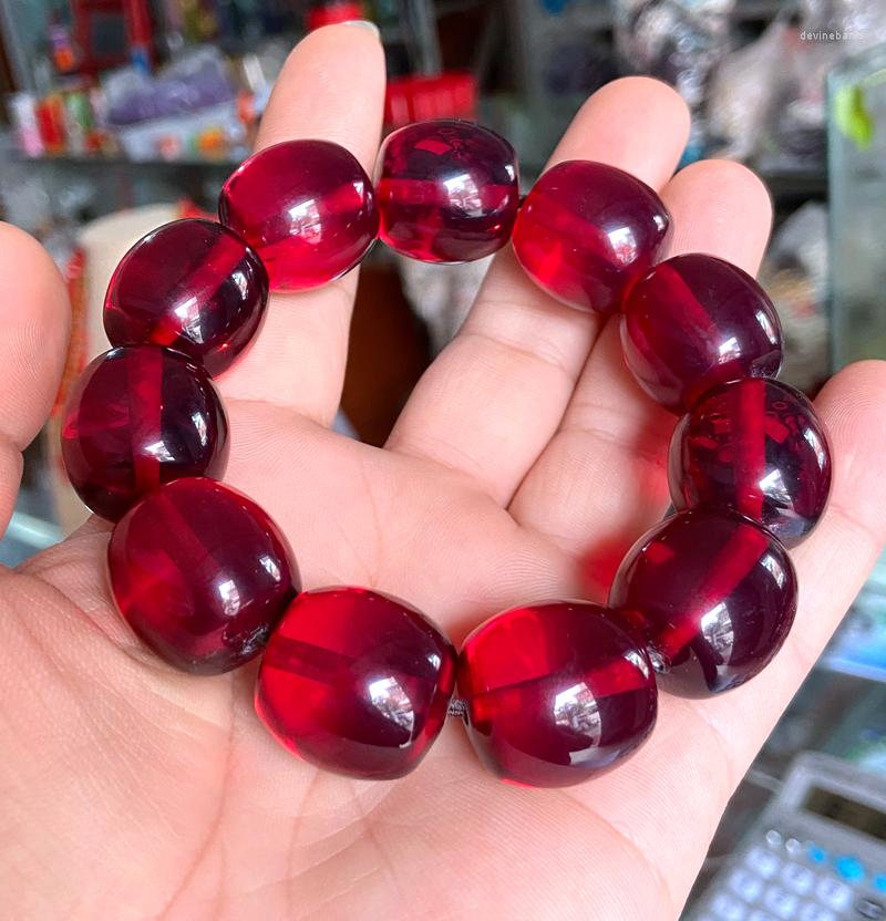 

Strand Certificate 20 21mm Natural Drum Mexican Red Amber Beads Bracelet 7.5"