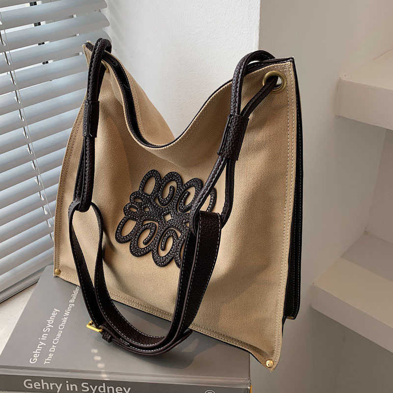 

handbag 2023 hand fashionable new shoulder capacity female autumn versatile canvas commuter messenger bag college student Tote Bag, White4