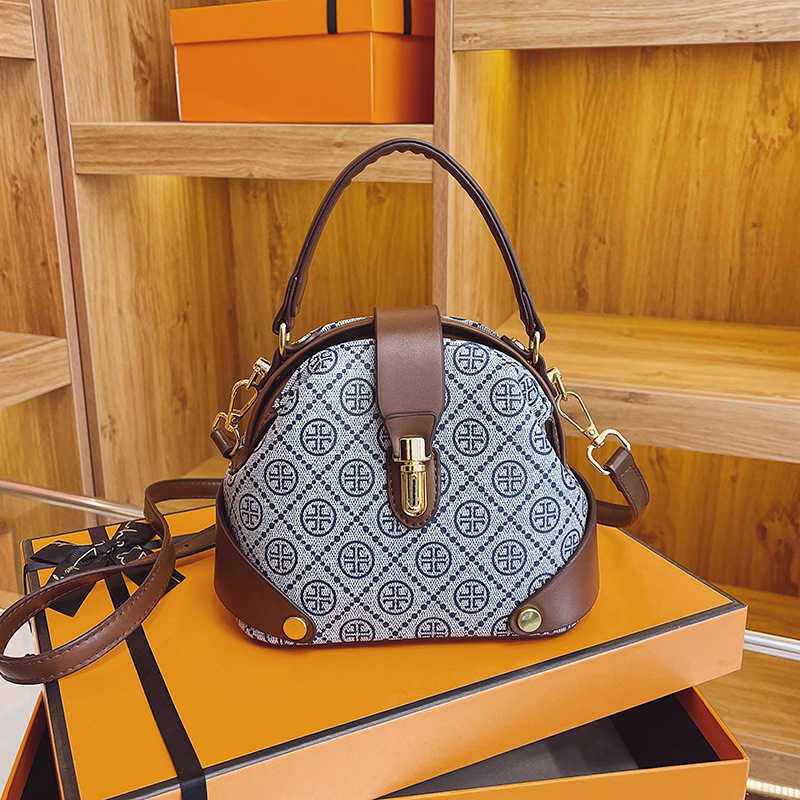 

handbag 2023 hand fashionable new fashion printed small mass texture messenger versatile portable shoulder bag, Style one