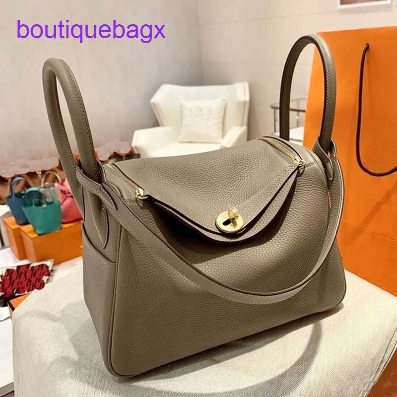 

Designer Lindi Bags H ermes on sale 2023 new versatile mother bag cowhide Doctor Bag Leather Women's one shoulder portable pillow medicine 07D9Have Real Logo, Elephant grey trumpet
