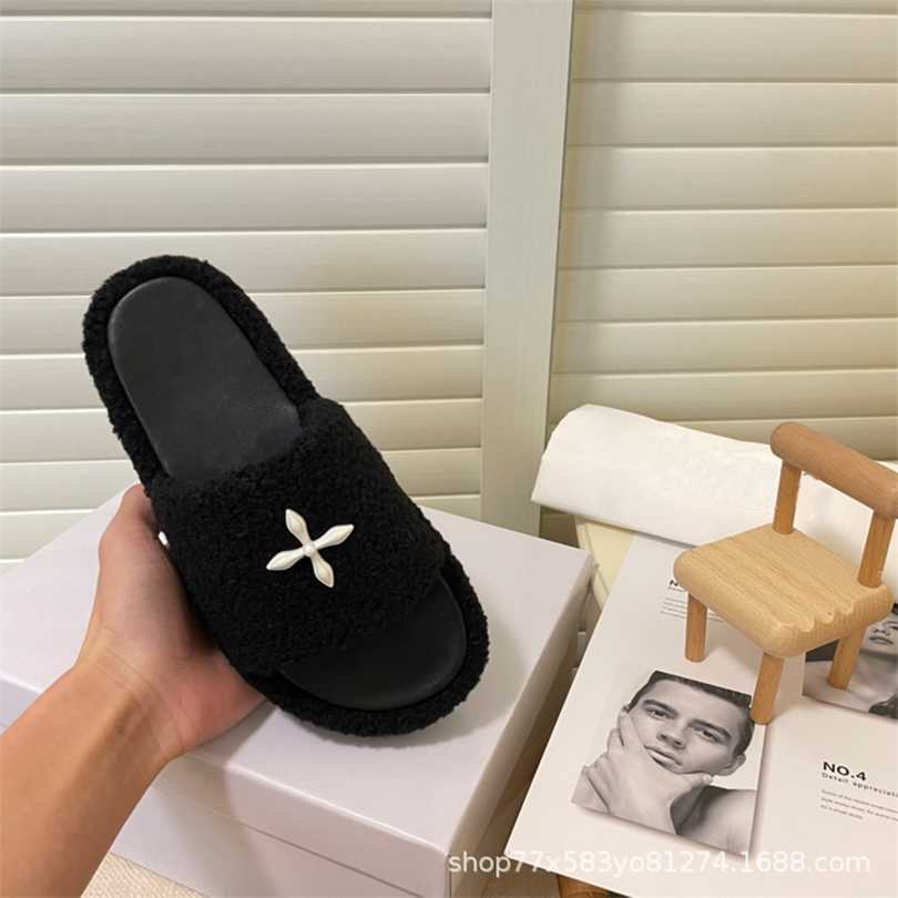 

Cross-hair moccasins female black thick bottom wearing a flip-flop slipper