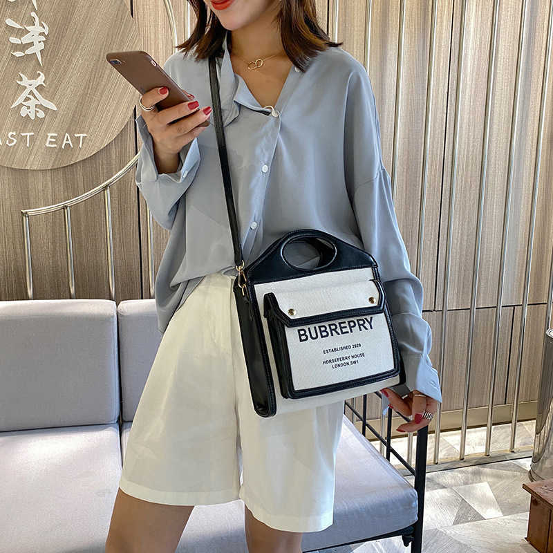 

handbag 2023 hand fashionable new fashion messenger trend portable ins canvas splicing contrast single shoulder personalized bag, White9