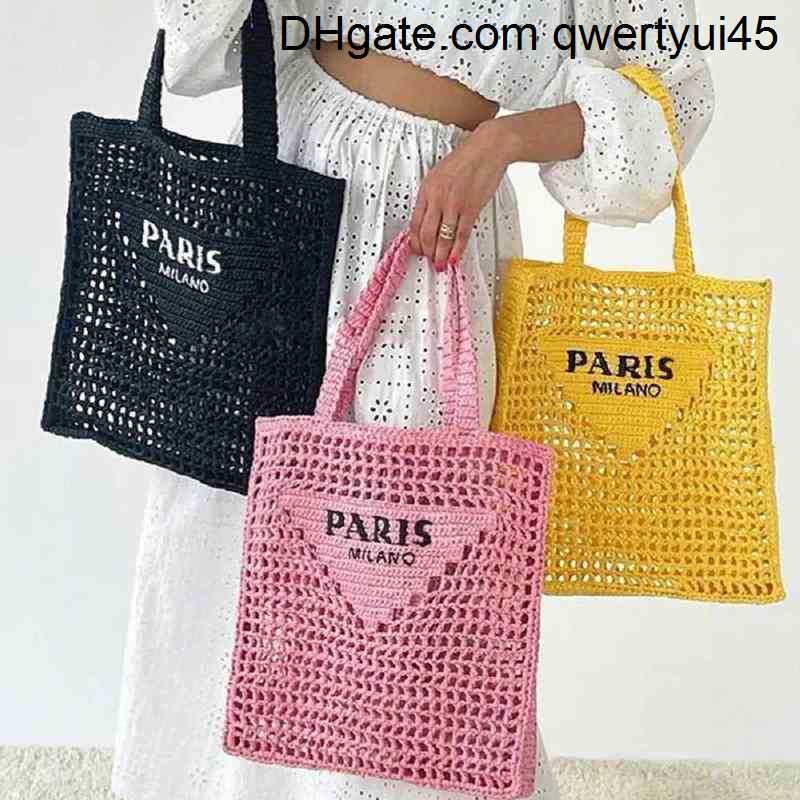 

qwertyui45 Totes Designer Brands Hollow Letters Raffia Straw Tote Fashion Paper Woven Women Shoulder Bags Summer Beach Handbag Luxury Bag 022123H, Pink