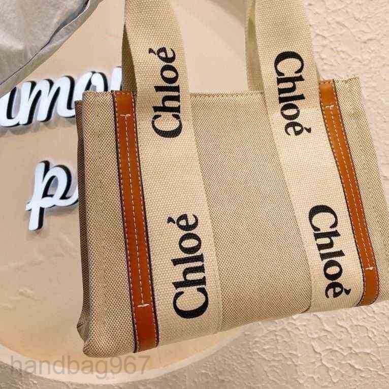 

Designer Cloe Tote Bag Hands Bags Woody outlet Handbag 2023 Fashion One Shoulder Canvas Niche Design Portable Large Tote Women's Cap GMM0
