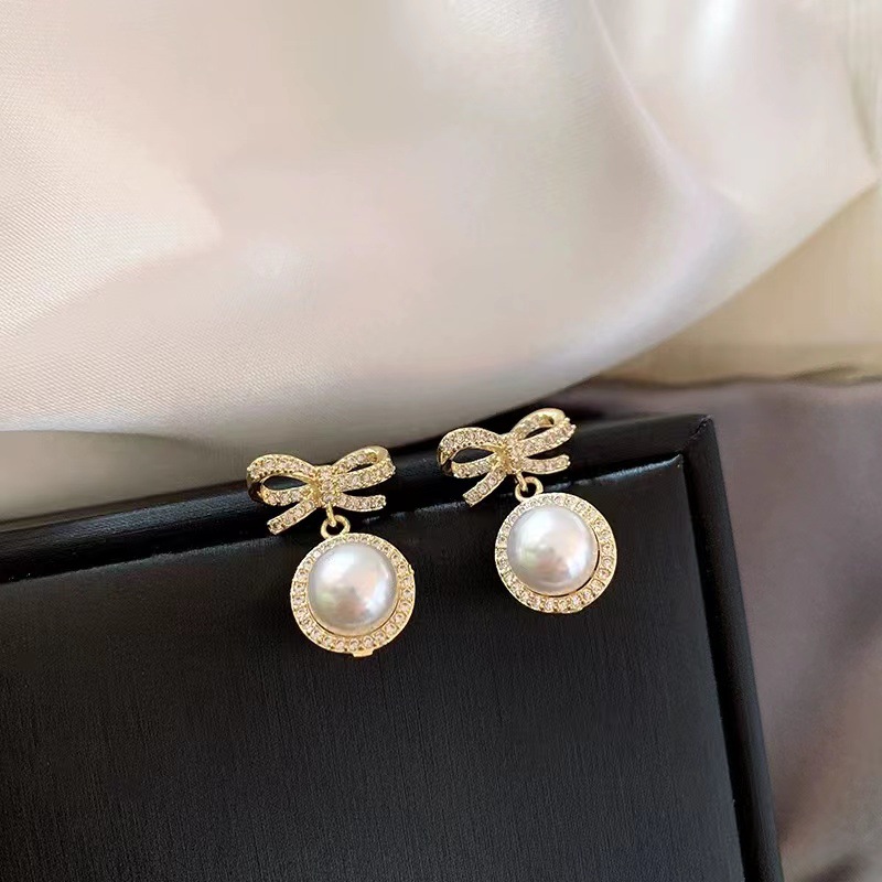

Super fairy pearl bow Charm earrings trendy net red personality versatile flash diamond earrings sweet temperament high sense
