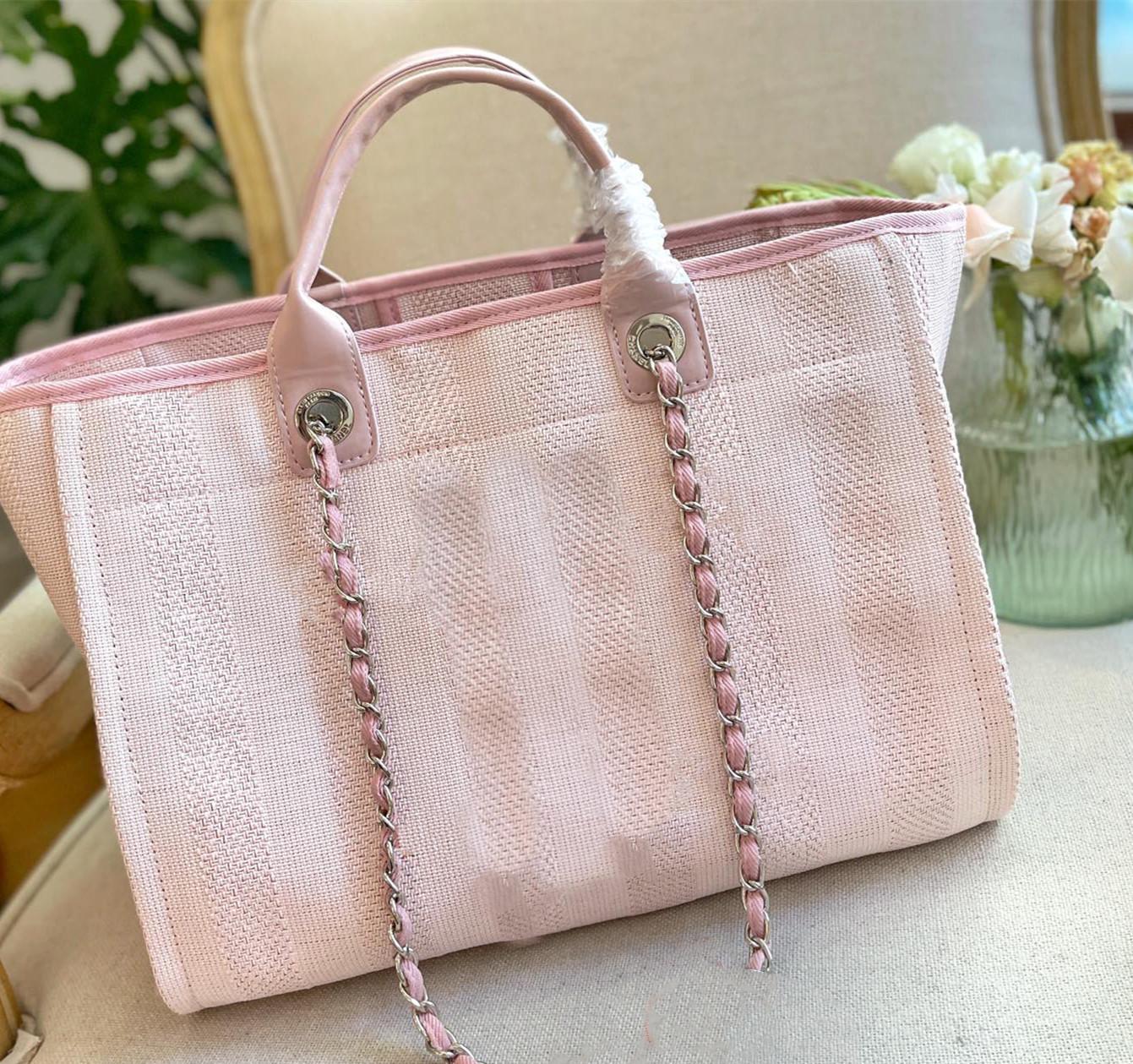 

2023 High quality women's large capacity Shopping Bag Fashion Shoulder bag chain design handbag designer bagsmust have for seaside travel, Pink