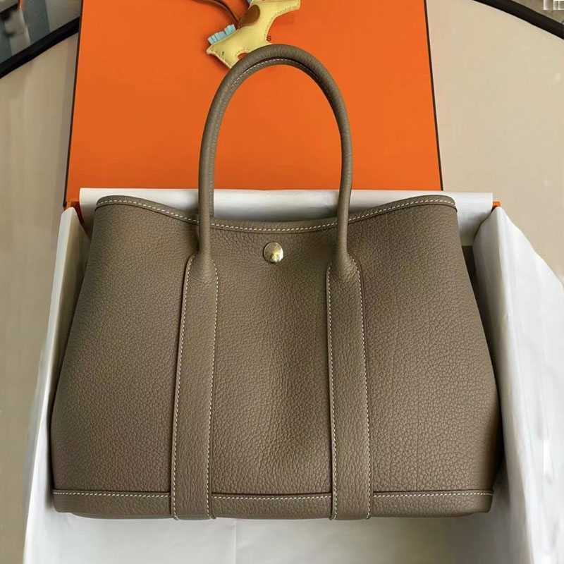 

herme bags 2023 new high-grade garden bag leather tote bag large capacity computer commuting women's bag carrying mommy bag, Milk shake white small 25cm counter