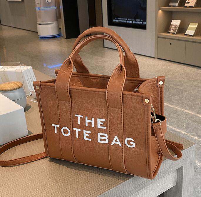 

2023 New Marc Jocob Women TOTE BAG letter PU Leather bag diagonal handbag hand shopping bag M00184