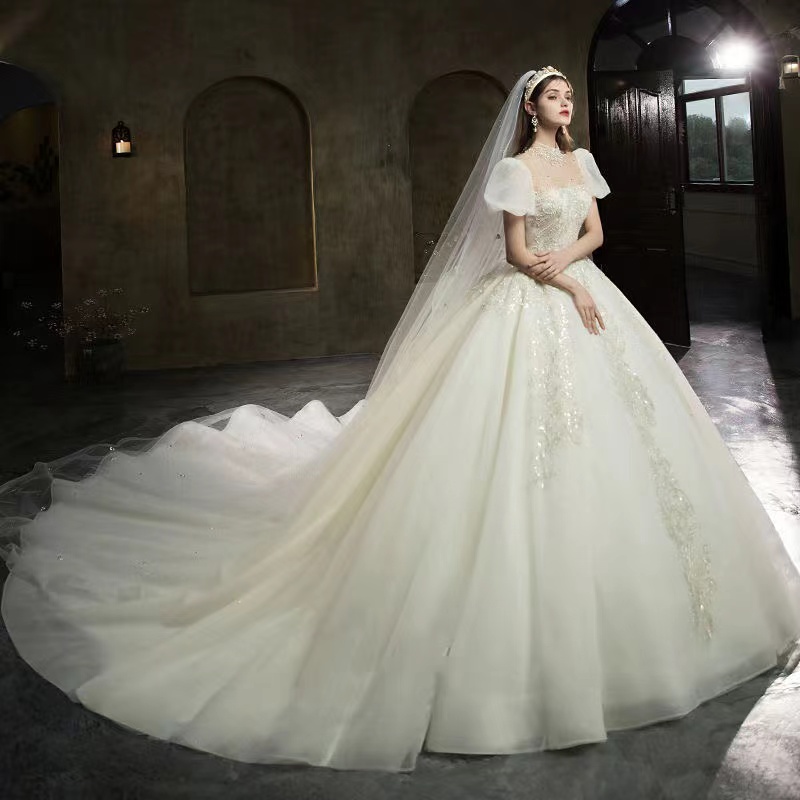 2023 Robes De Mariée En Tulle Elegnat Robes De Mariée Illusion Belle Décolleté A-ligne Appliques Cour Train Robe De Mariee Robe De Mariée Musulma