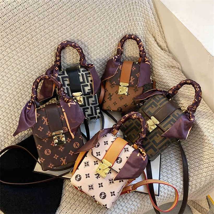 

Handbag High quality 2023 new bag Three dimensional square box women's flip latch shell portable small messenger shoulder, Khaki4