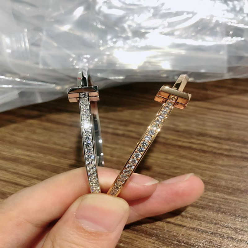 

Factory designer bangle The new T1 precision titanium steel double T bracelet has no drill half and full is light luxurious the