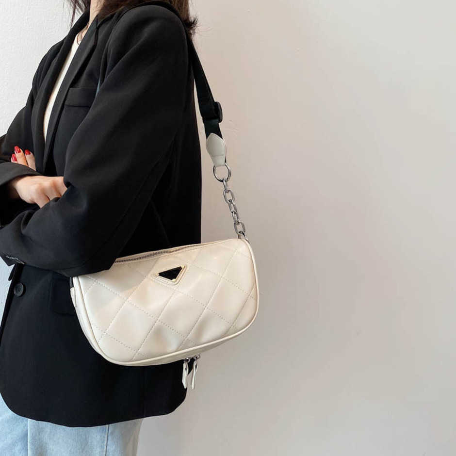 

2023 New Luxury High Quality Fashion Bag Women's new net red versatile pillow women's messenger niche cowhide Ling lattice shoulder bagHigh, White10