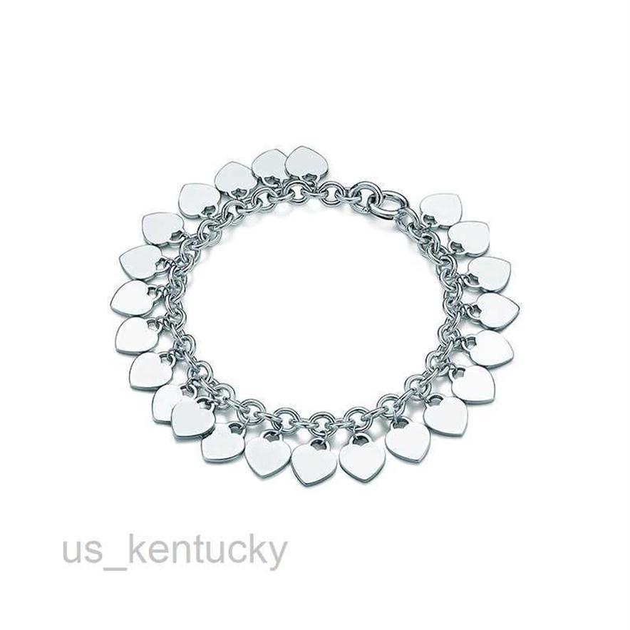 

Charm Bracelets Famous 925 Sterling silver designer brands Classic Charm DIY Bracelet Multi Heart Label Handwear L221216259h