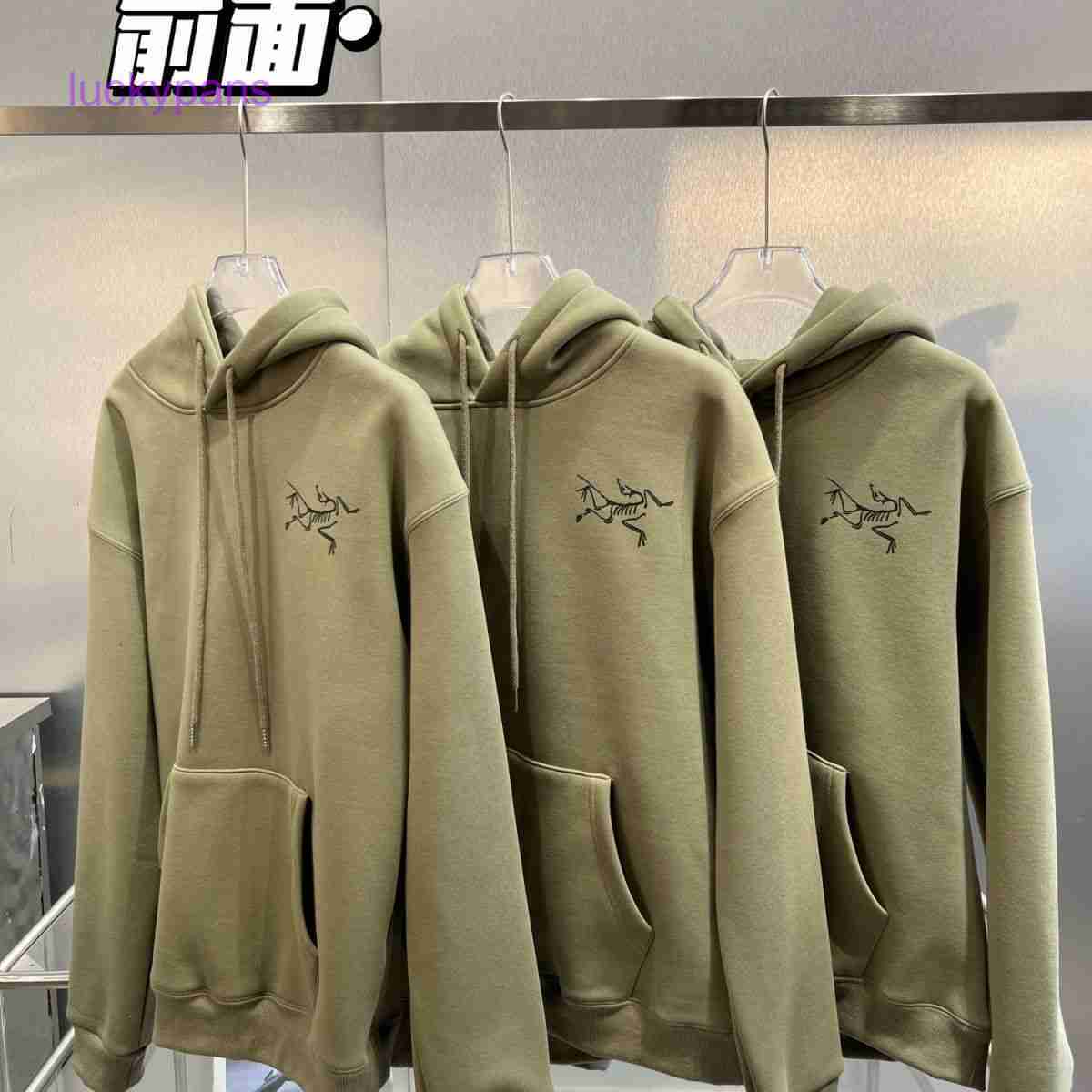 

Genuine Arcterys Hoodies for sale Olive green sweater bird home. The plush hooded is so white, Beige