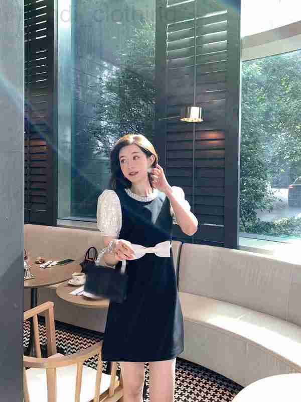 

Casual Dresses designer Shenzhen Nanyou high-end early spring style sequin bow bubble sleeve skirt WEOK, Black and white