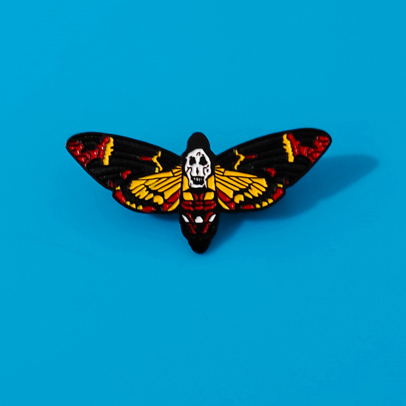 

Hannibal Rising pin The Silence of the Lambs Film and Television Hannibal brooch ghost face moth metal badge lapel shirt bag pin jewelry accessories, As picture