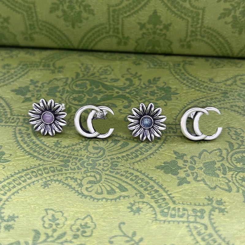 

Ear studs Designer earrings Women's interlocking flower rivets Asymmetric two-color earrings Fashion luxury jewelry alloy 925 High quality birthday gift party good