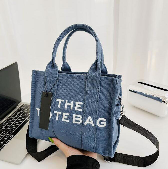 

2023 Marc the tote Bag Totes Bag Women designer bags Fashion all-match Shopper Shoulder leather HandbagsJ00760, Red