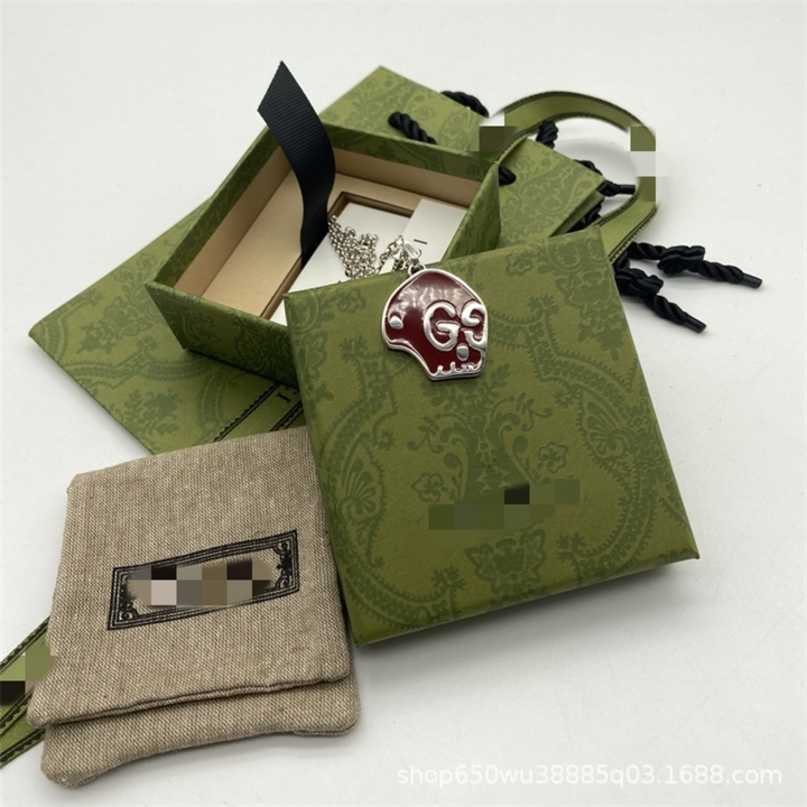 

60% off designer jewelry bracelet necklace ring 925 ancient enamel drop glue little ghost Pendant hip hop trend skull couple