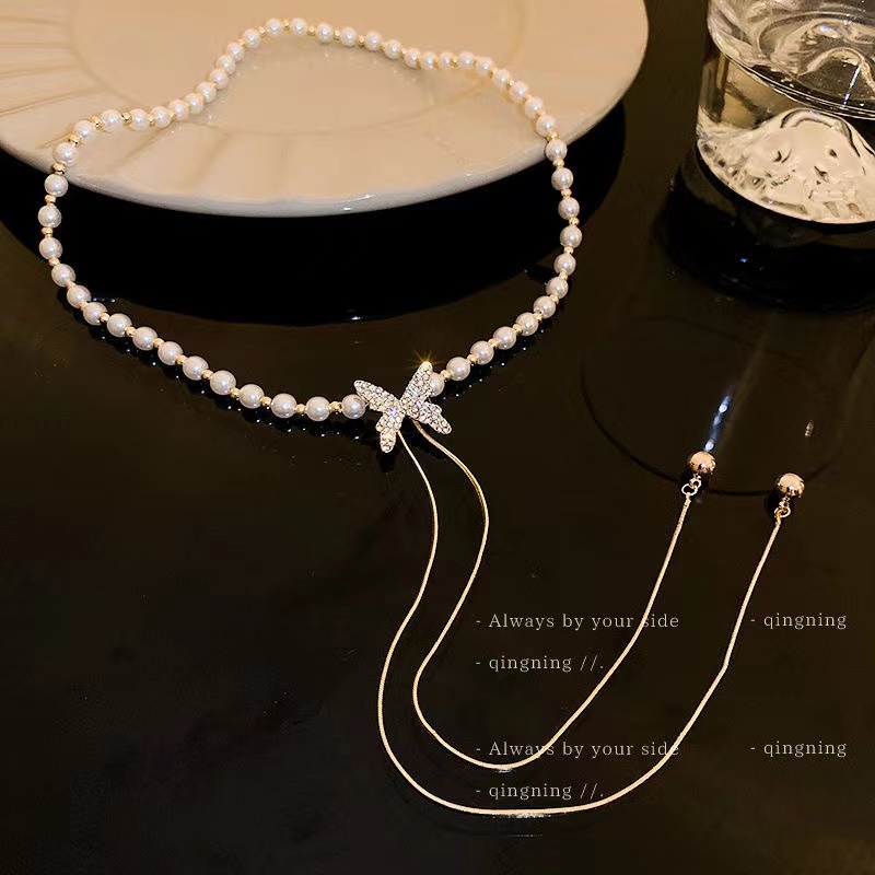 

Diamond-encrusted butterfly pearl necklace, feminine light luxury niche collarbone chain, tassel pendant, net celebrity high-end sense necklace