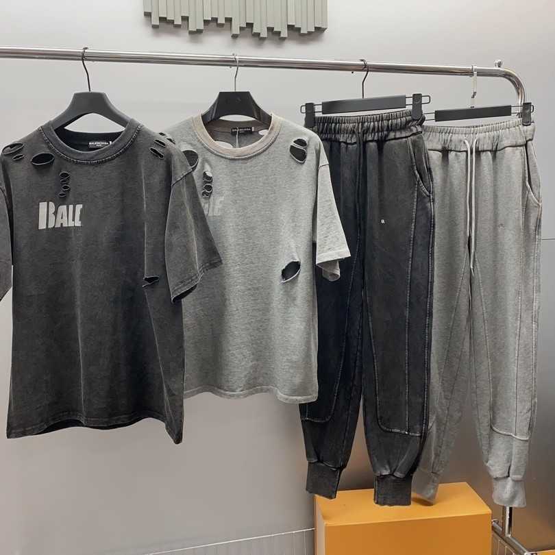 

Designer sports suit Casual suits Fashion Tides brand 2023 new spring and autumn broken print wear damage crewneck cotton wave short sleeve pants tie suit, Suit 1