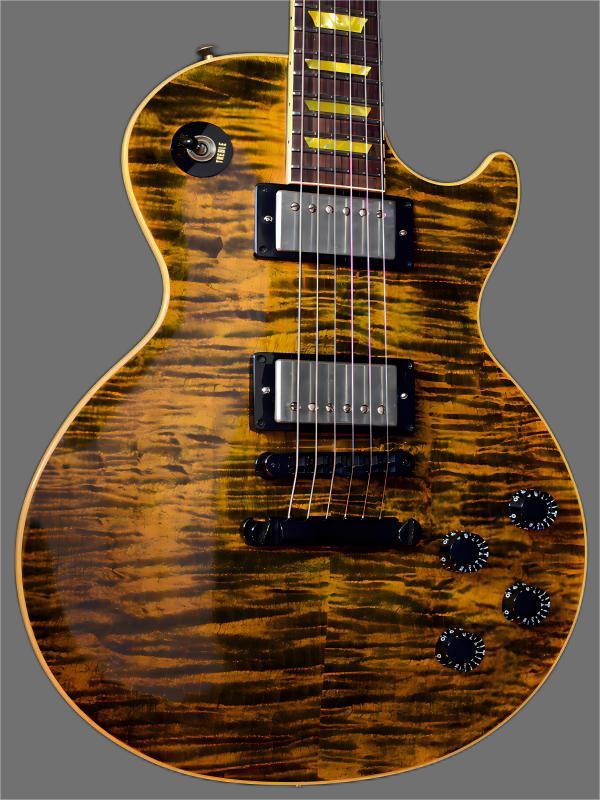 

Mahogany body and neck with flame maple guitar top